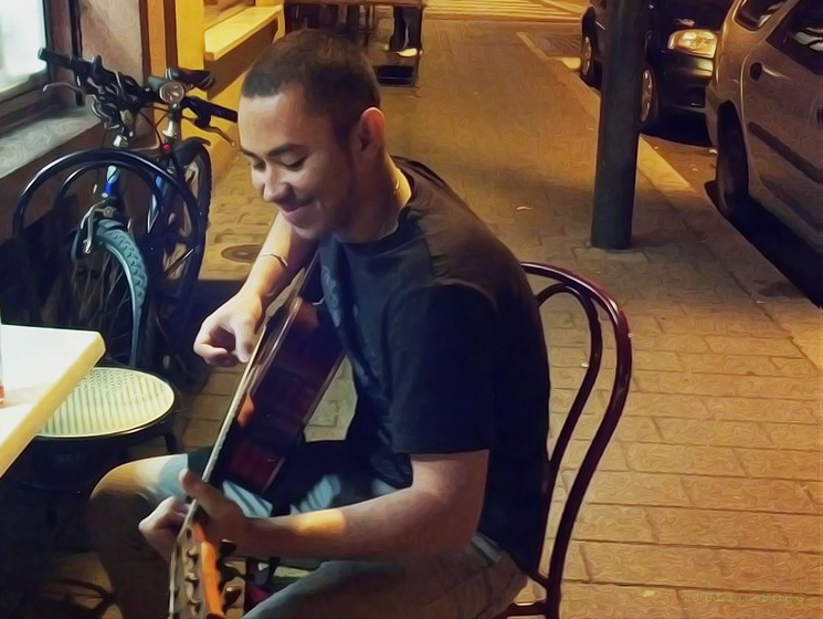 Julio Fong Playing Guitar